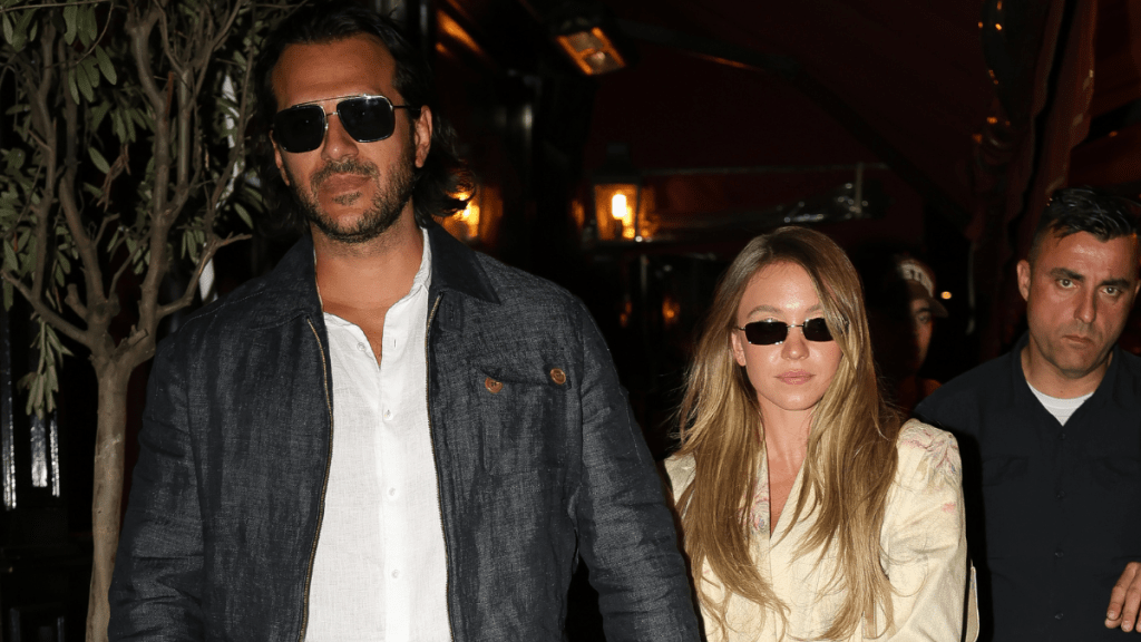 Jonathan Davino and Sydney Sweeney are seen leaving a Italian restaurant on July 11, 2024 in Paris, France.