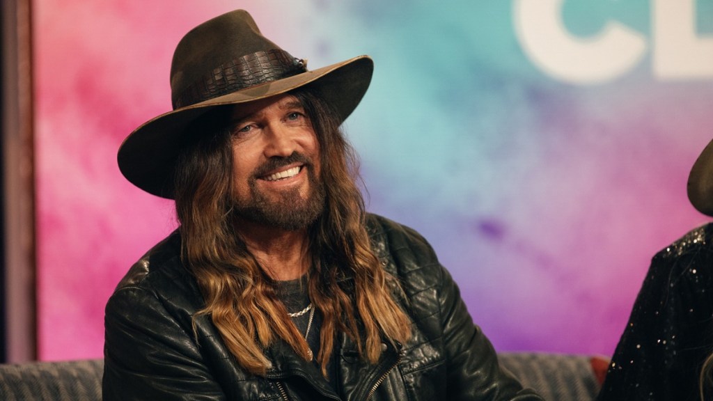 Elizabeth Hurley & Billy Ray Cyrus Cuddle in New Photos