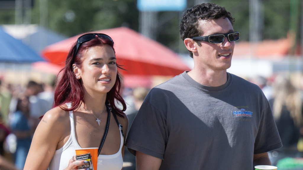 Dua Lipa & Fiancé Cozy Up In Photos Amid Singer's Engagement Announcement