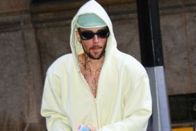 Justin Bieber standing on business