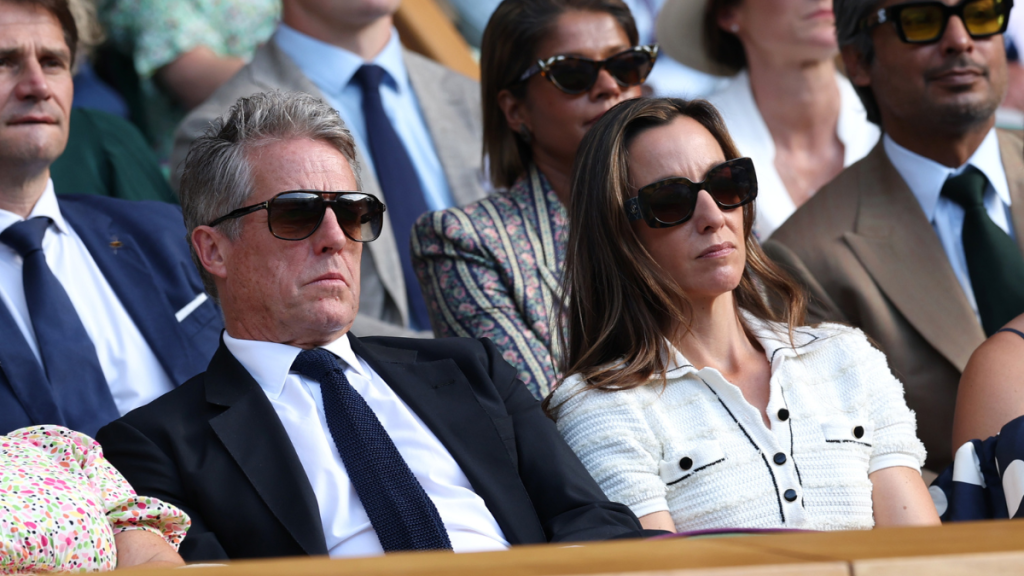 Hugh Grant Spotted Sleeping at Wimbledon Behind Queen Camilla