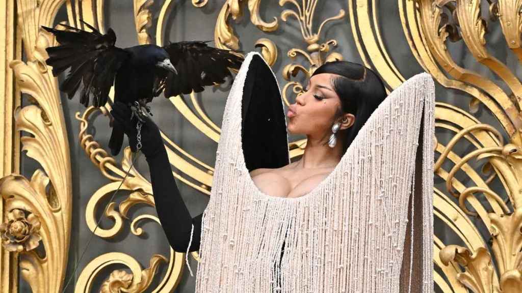 Cardi B Holds a Crow In Her Hand During Paris Couture Week Look