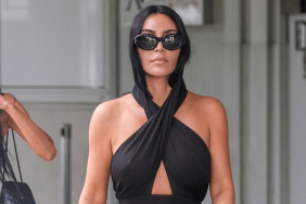 Kim Kardashian Goes Braless & Flaunts Her Curves in Gray Gown