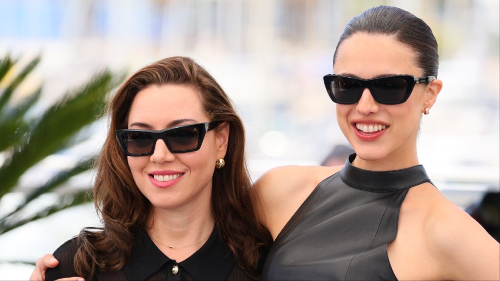 Aubrey Plaza Licks Her Finger After Wiping Margaret Qualley’s Chin