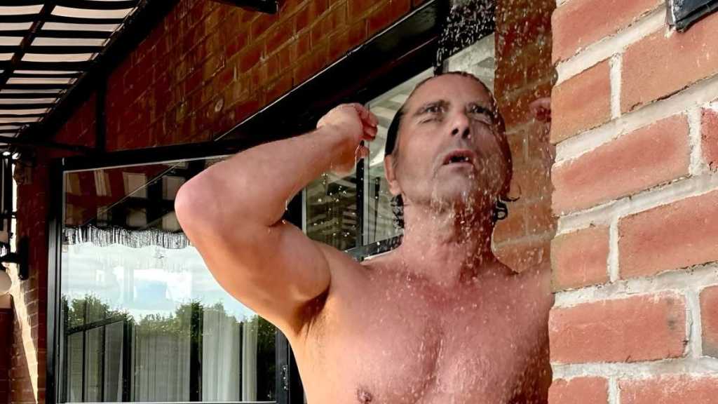 John Stamos Flaunts His Physique in Shirtless Shower Photo