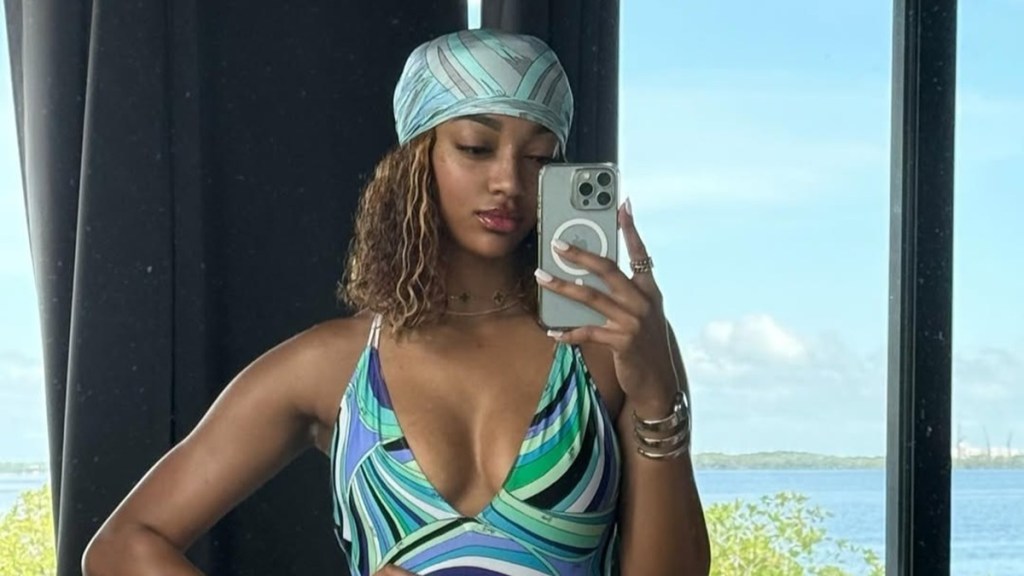 Angel Reese Shows Off Her Toned Body in Swimsuit Look 
