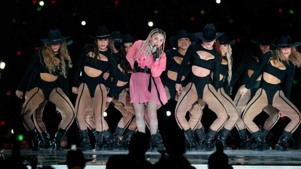 Madonna Heats up Social Media in Bold Sheer Pink Lace Nightgown