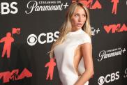 Alix Earle Wears White Mini Dress With Dangerously Wide Side Cutouts at VMAs