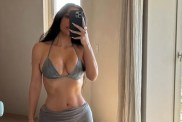 Kim Kardashian Flaunts Her Curves in See-Through Tank Top & Leggings