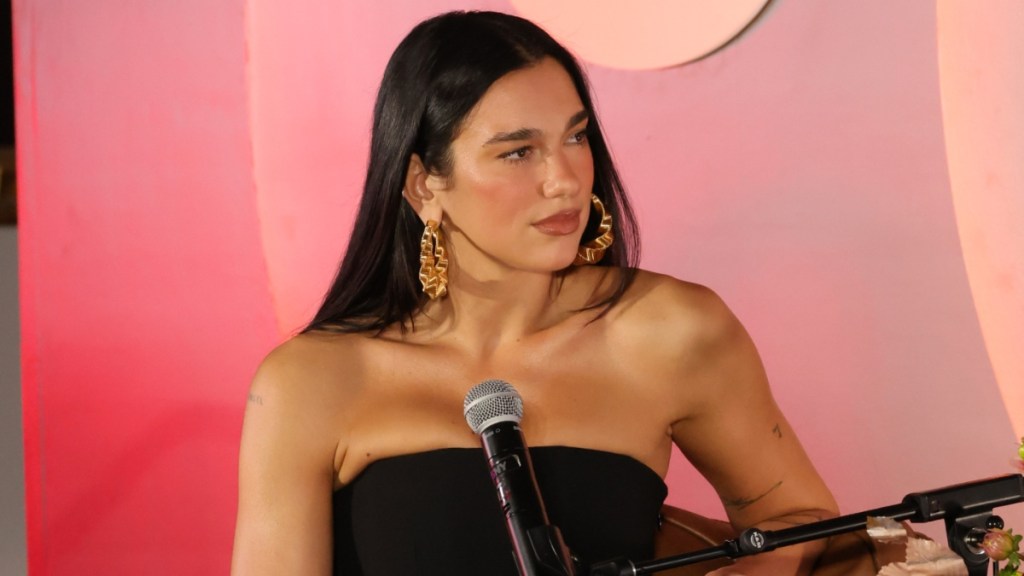Dua Lipa Turns Heads in Off-Shoulder Black Dress at NYC Event