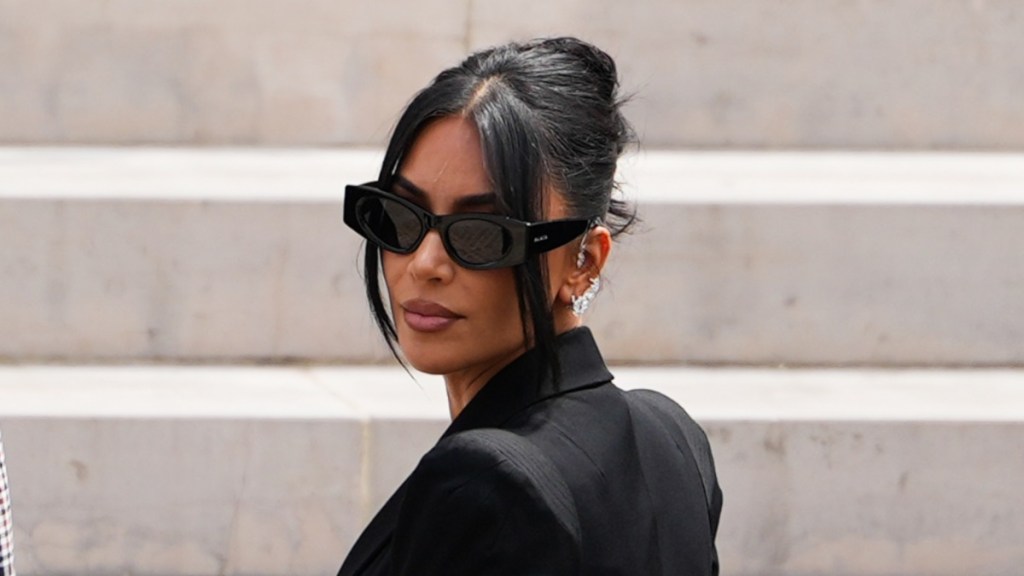Kim Kardashian Turns Heads in Sheer Bodysuit Photos