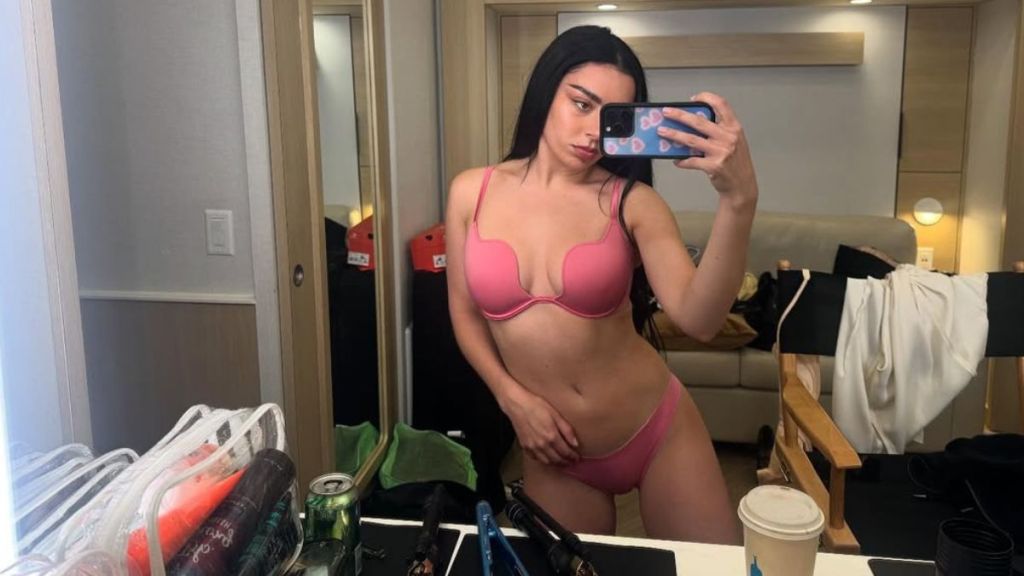 Charli XCX Is Twice As Sultry in Plunging Corset Photos