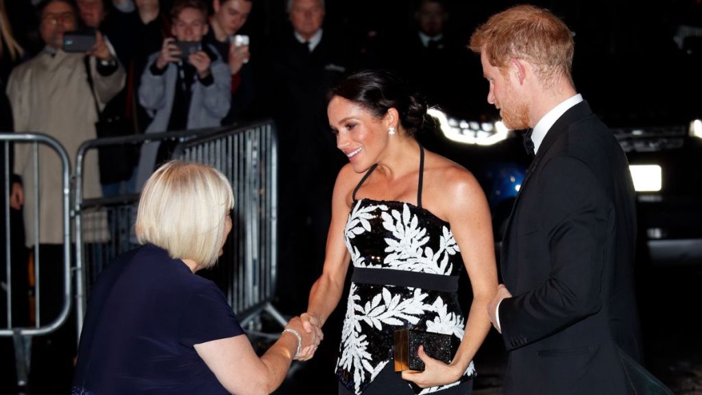 Prince Harry Couldn't Fully Hide His Emotions When Meghan Markle Curtsied, Expert Says