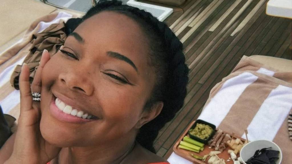 Gabrielle Union Rocks Orange Bikini in PDA-Filled Pics With Dwyane Wade