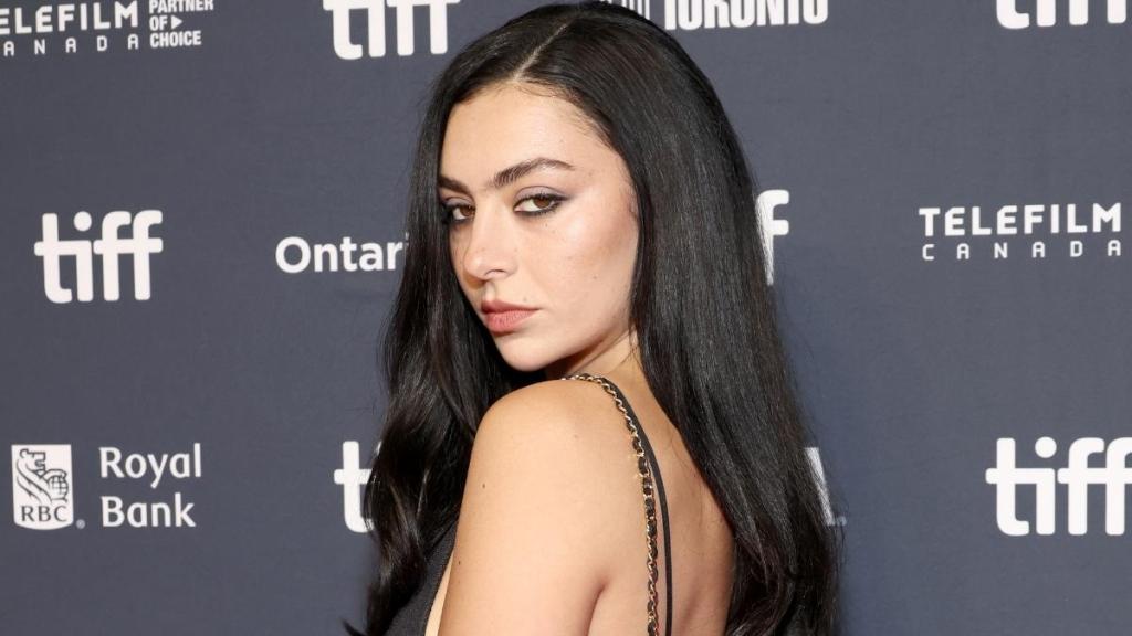 Charli XCX Wears Sheer Little Black Dress in Venice