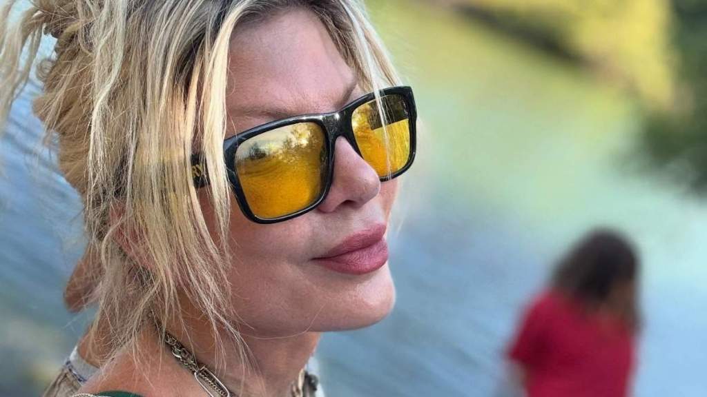 Bikini-Clad Tori Spelling Flaunts Her Curves As She Goes Fishing