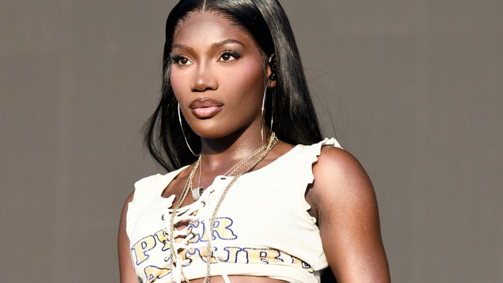 Doechii Showcases Her Toned Midriff in Crop Top