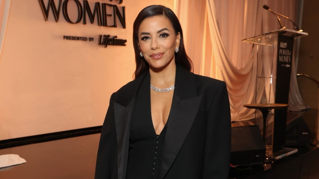 Eva Longoria Looks 'Divine' in Daring Neckline Dress