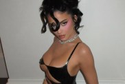 Kylie Jenner Sitting in Latex Cut-Out Dress Will Make You Look Twice