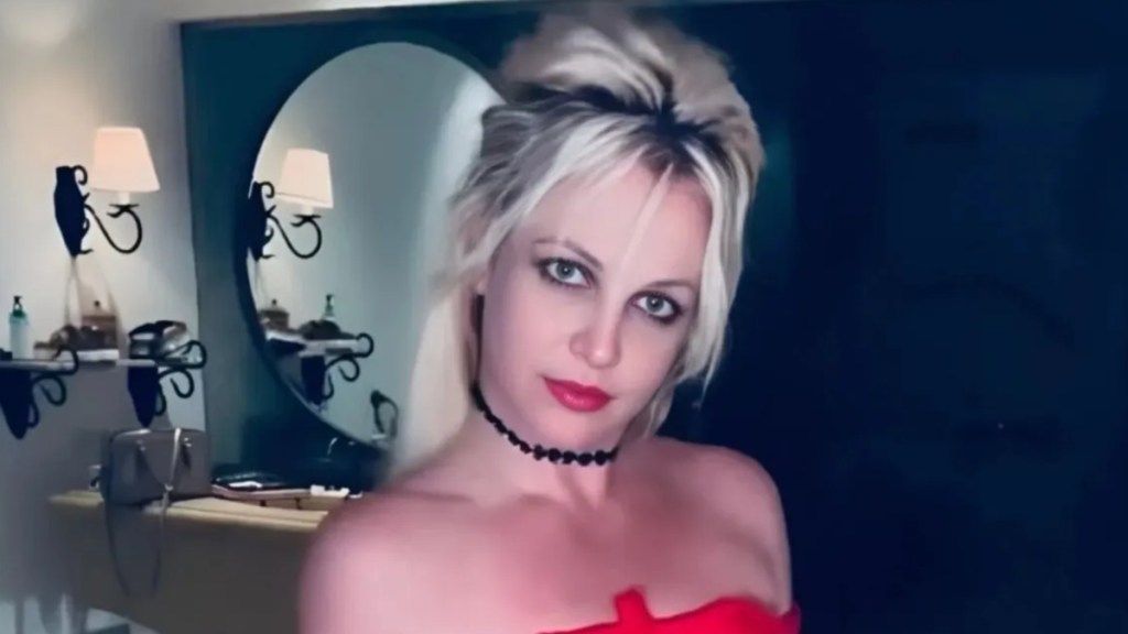 Britney Spears Shows Off Her Pink Mini-Dress With Bold Neckline