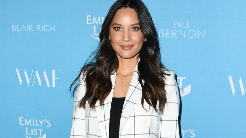 Olivia Munn Turns Heads in White Pantsuit With Bralette Underneath