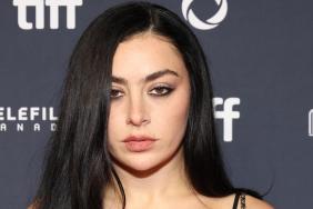 Charli XCX in Sheer Black Off-Shoulder Outfit Has Fans Saying 'Height of Glamor'