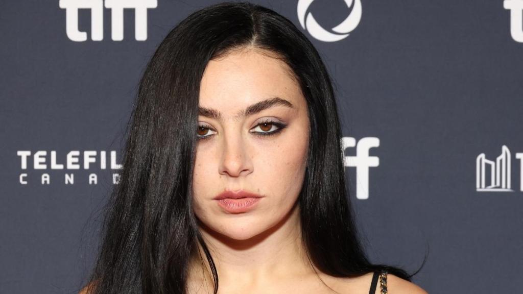 Charli XCX in Sheer Black Off-Shoulder Outfit Has Fans Saying 'Height of Glamor'