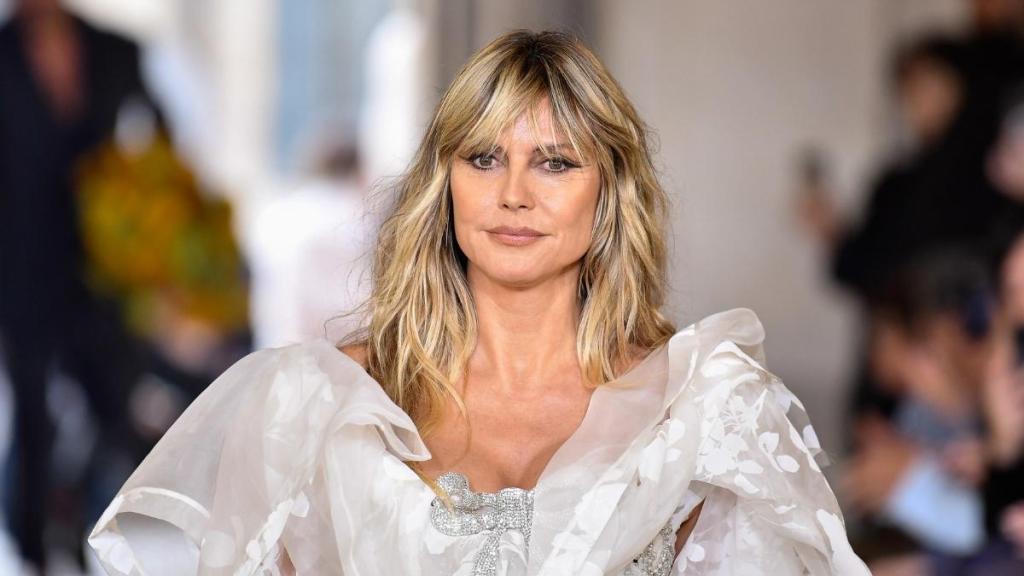 Video: Heidi Klum Confuses Fans by Kissing a Man Who Isn't Her Husband