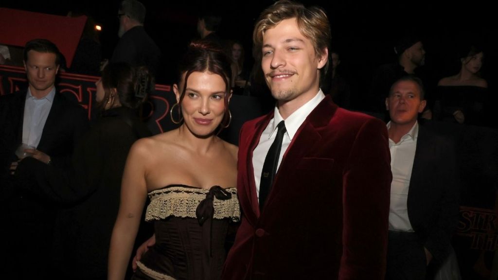 Millie Bobby Brown Spells Magic in Corseted Top & Skirt