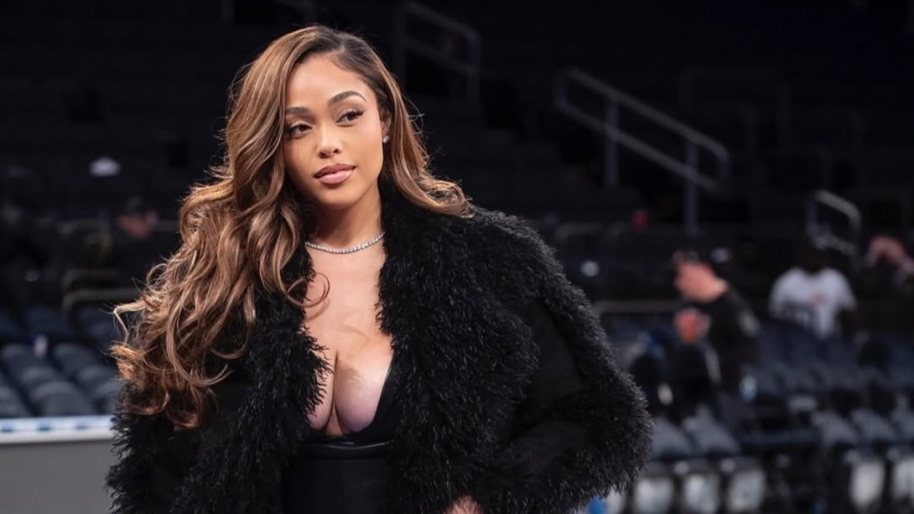 Jordyn Woods' Game Attire Includes Daring Top