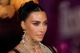 Kim Kardashian in Red Backless Dress Is Must See