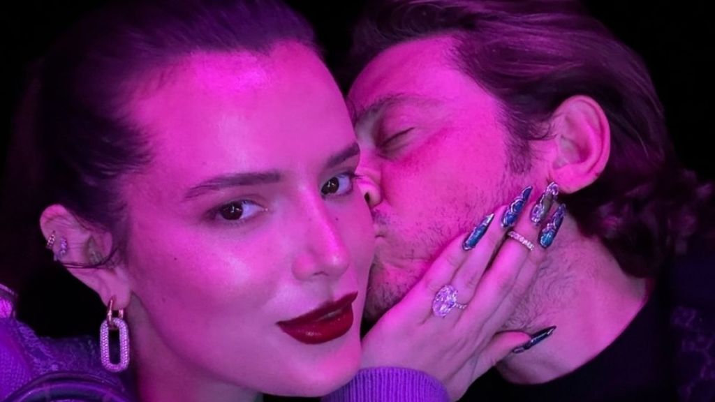 Bella Thorne's Fully Sheer Top Pops off in PDA-Packed Photo