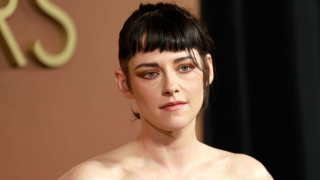 Kristen Stewart’s Micro Miniskirt Is Barely Visible Under Blazer