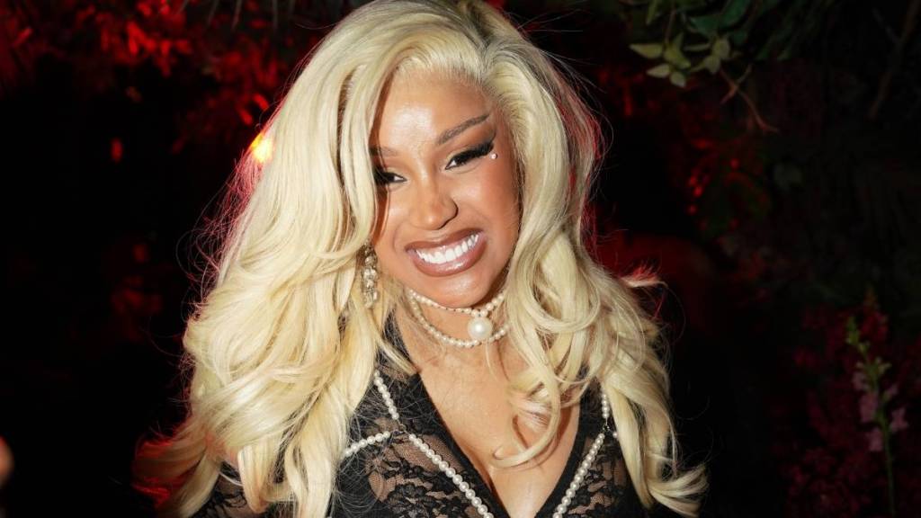 Cardi B’s Black Cutout Dress Distracts You From Christmas Decor