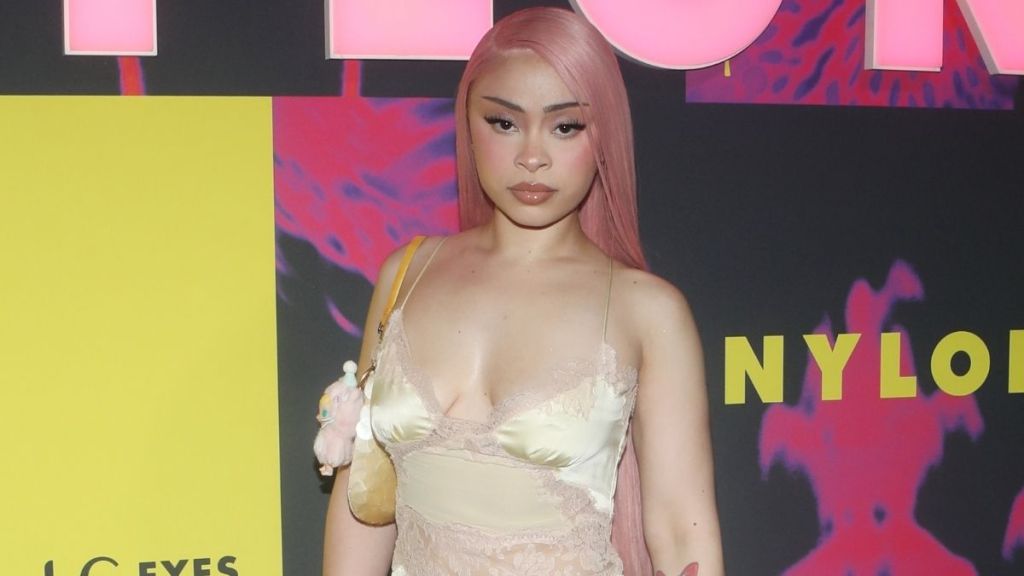 Ice Spice Wearing Striking Yellow Lace Dress Has Fans Calling Her ‘Knockin’