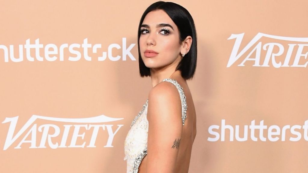 Dua Lipa Posing in Backless Top Is Impossible to Look Away From