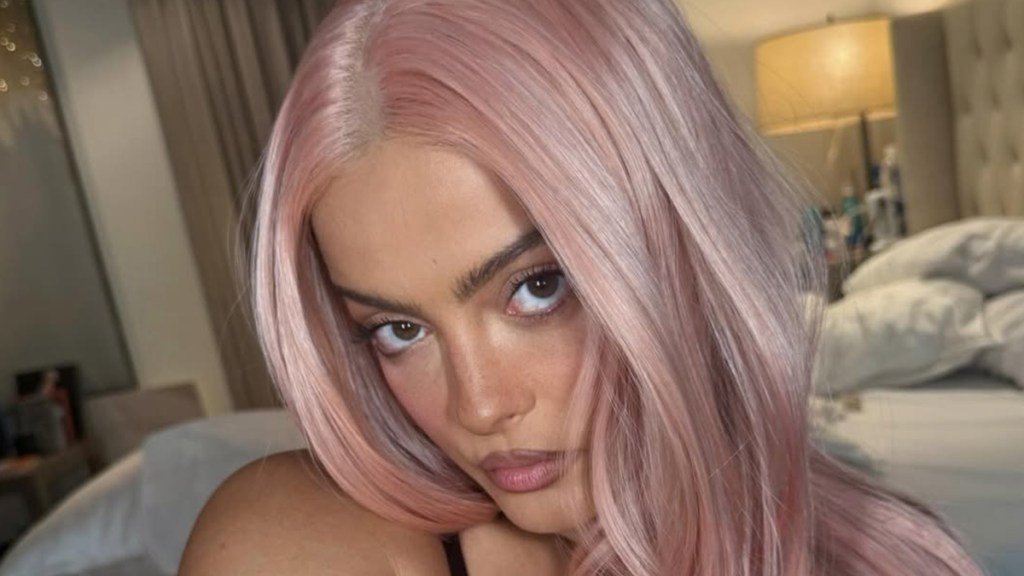 Bebe Rexha’s Lace Bra Peeks Out From High-Slit Dress