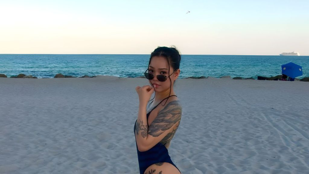 Bella Poarch's Black Swimsuit Comes With a Cheeky Surprise