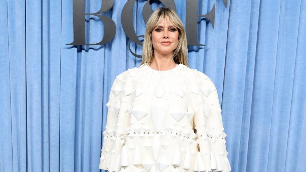 Heidi Klum's Sheer Tights Complete Her Super Tiny Miniskirt Looks