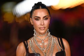 Kim Kardashian in Christmas Mood With Red Tight Pants