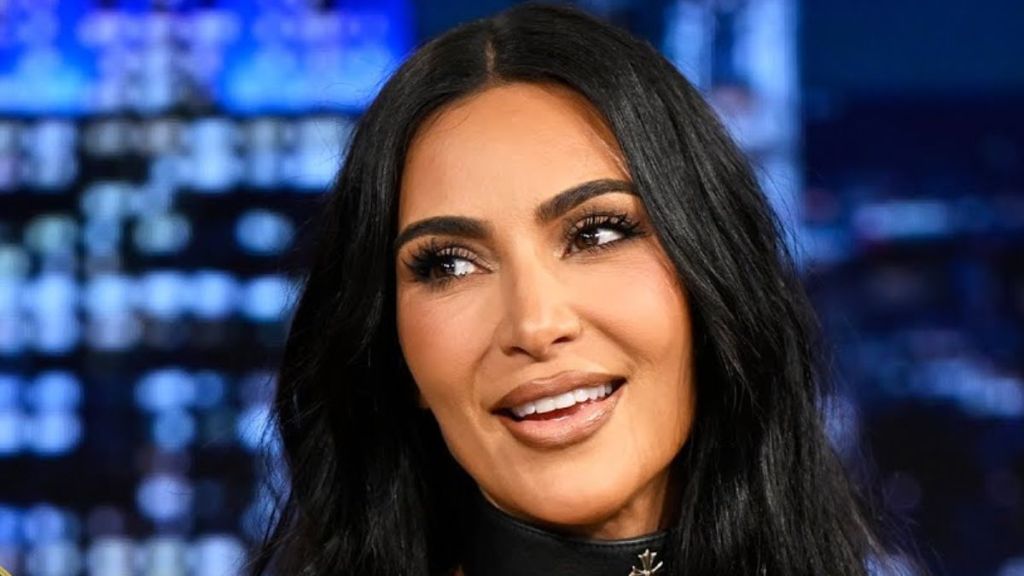 Kim Kardashian Lying Down in String Bikini Is Guaranteed to Distract You