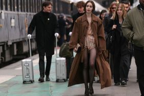 Lily Collins' Ultra Tiny Romper Is Barely Visible Under Her Large Coat