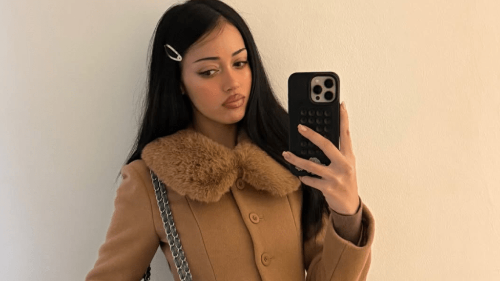 Cindy Kimberly's Thong Peeks Through Her Sheer Dress in Photos