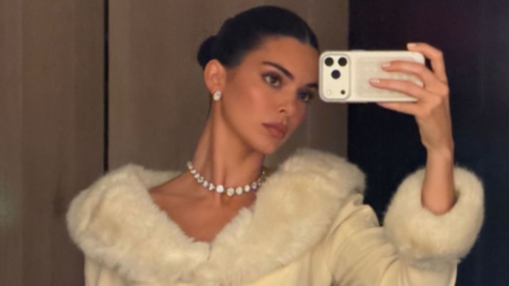 Kendall Jenner on Bed in Fur Fit & Heels Screams 'Queen'