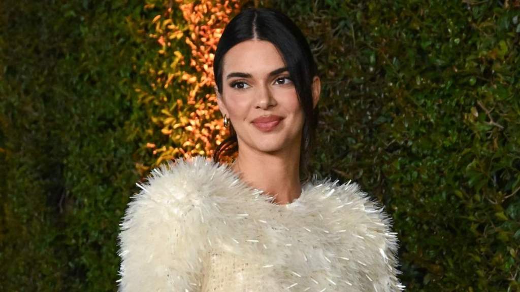 Kendall Jenner Sitting Down in Bold Red Dress Will Make You Look Twice