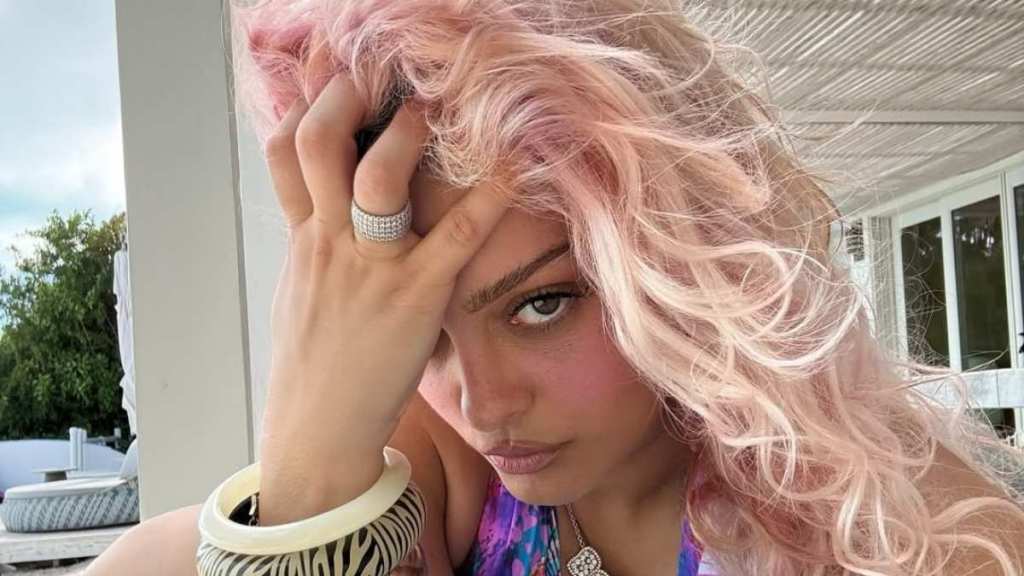 Bebe Rexha Dips in Water Wearing a Bold Swimsuit