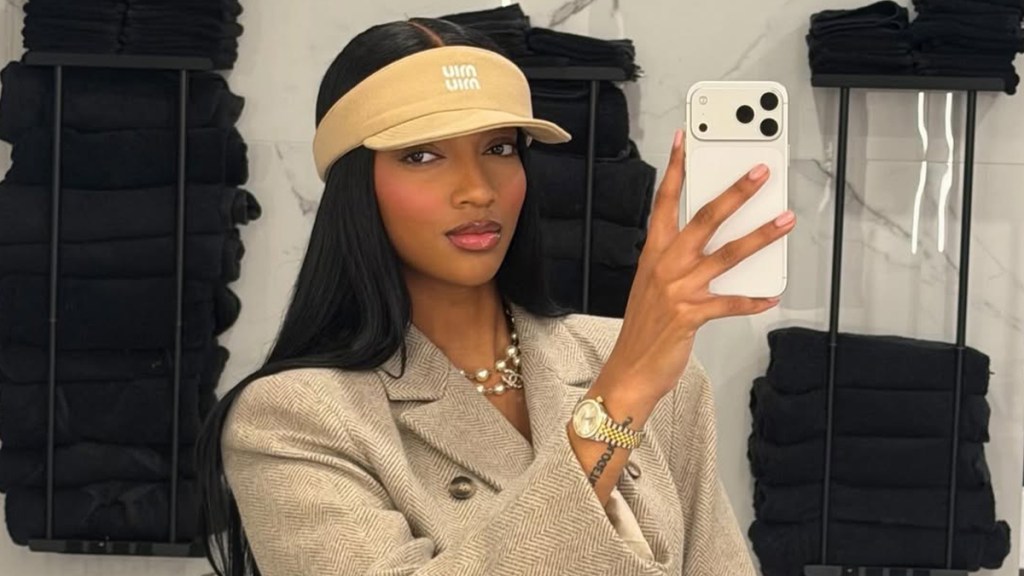 Angel Reese’s Micro Mini Shorts Aren’t Visible Under Coat in Pics