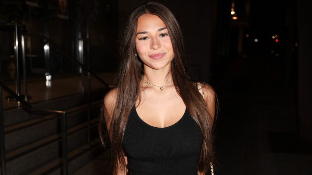 OnlyFans’ Sophie Rain Gets Cheeky Sitting in Animal-Print Bikini