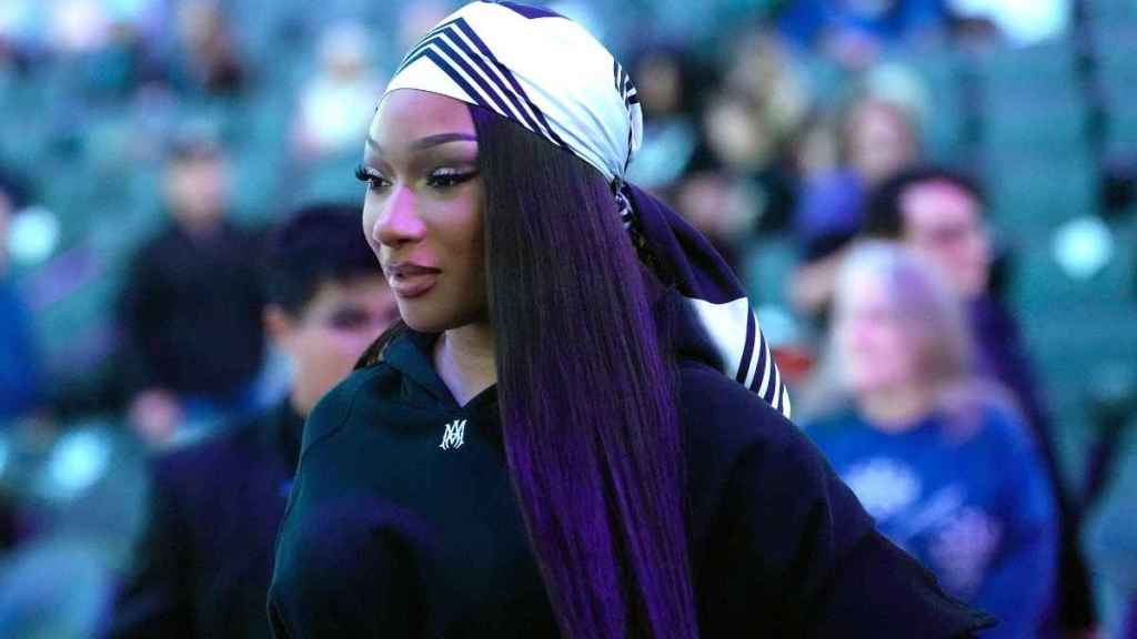 Megan Thee Stallion Goes Bold in Leotard & Sheer Tights for Dunkin'