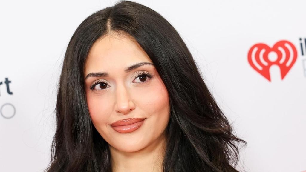 Leah Kateb Poses in Bold Bodysuit in Throwback Photo